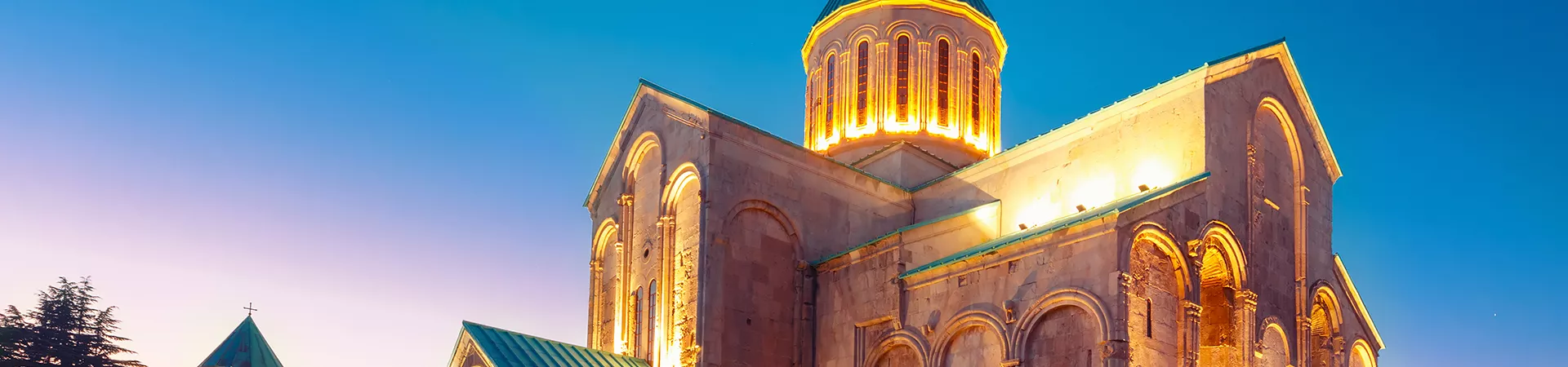 Two babies wearing colorful hats